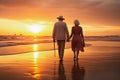 Happy senior retired couple walking a beach