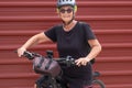 Happy senior woman cyclist in outdoor excursion in urban city. Elderly people ejoying healthy lifestyle Royalty Free Stock Photo