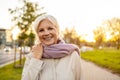 Senior woman enjoying autumn colors