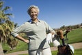 Happy Senior Woman With Golf Bag Royalty Free Stock Photo