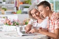 Happy senior woman with her grandson using tablet at home Royalty Free Stock Photo