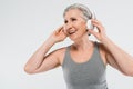 happy senior woman listening music in Royalty Free Stock Photo