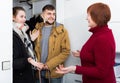 Happy senior woman meeting daughter with husband Royalty Free Stock Photo