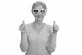 Happy senior woman smiling while wearing sunglasses with peace sign and giving thumbs up Royalty Free Stock Photo