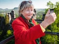 Happy senior woman is taking a selfie Royalty Free Stock Photo