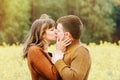 Happy sensual couple kissing in love outdoor into the depth of b Royalty Free Stock Photo