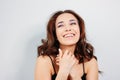 Happy sensual smiling girl asian young woman with dark long curly hair in black underwear on white background Royalty Free Stock Photo