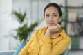 Happy serene woman posing at home