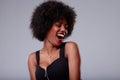 Happy sexy attractive young Black woman laughing Royalty Free Stock Photo