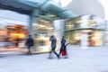 Happy shopping, people walking, motion blur