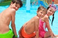 Happy siblings by pool Royalty Free Stock Photo