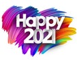 Happy 2021 sign on colorful brush strokes background