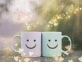 Happy similing face, mug couple on a window sill cuddle, cup of coffee with hearts, relationship and friendship concept, valentine