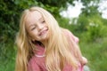 Happy with the simple things. Little girl wear long hair. Small girl with blond hair. Happy little child with adorable