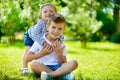 Happy sister and brother together in park