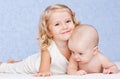 Happy sister hugging baby brother Royalty Free Stock Photo
