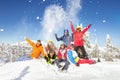 Happy skiers and snowboarders winter vacations Royalty Free Stock Photo