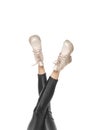 Close-up slender female legs in stylish boots isolated on white background Royalty Free Stock Photo