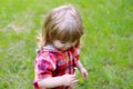 Happy small boy on green grass Royalty Free Stock Photo