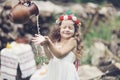 Happy small girl outdoor. Girl having fun in spring park. Blurred background in sunset Royalty Free Stock Photo