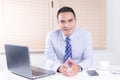 Happy smile asian business man sitting in office Royalty Free Stock Photo