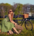 Happy, smile and bicycle with woman in park for cycling, freedom and nature. Spring, relax and peace with female person Royalty Free Stock Photo