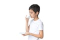 Happy smile boy with white cup in his hands. Teenager holding a cup of coffee. Child with milk or tea. White background.