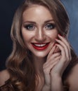 Closeup portrait of smiling caucasian young woman model with glamour red lips, bright makeup. Royalty Free Stock Photo