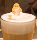 Happy cookie smile emerging in the coffee Royalty Free Stock Photo