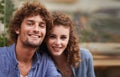 Happy, smile and portrait of couple at coffee shop on romantic, anniversary or morning date. Love, positive and young Royalty Free Stock Photo