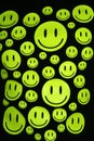Happy smiles over black background Royalty Free Stock Photo