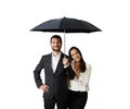 Happy smiley couple under black umbrella