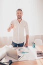 Happy smiling architect having break and drinking coffee Royalty Free Stock Photo