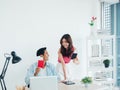 Happy smiling Asian couple, young man and woman holding passport and flight tickets after booking online success for summer. Royalty Free Stock Photo