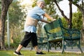 Happy smiling asian old woman exercising by stretching the leg muscles,workout,immunization,healthy female senior have strong knee Royalty Free Stock Photo