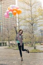 Happy smiling Asian woman holding balloons Royalty Free Stock Photo