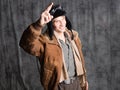 Happy smiling aviator pilot in retro style, a young man in a flight jacket