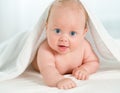 Newborn baby under the white towel Royalty Free Stock Photo