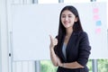 Happy smiling beautiful young asian business woman show thumbs up isolated on White board background in office.entrepreneur girl Royalty Free Stock Photo