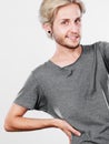 Happy smiling blonde man in grey t shirt Royalty Free Stock Photo