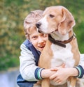 Happy smiling boy with his dog Royalty Free Stock Photo