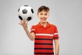 Happy smiling boy holding soccer ball Royalty Free Stock Photo