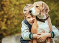 Happy Smiling Boy Hugs His Best Friend Beagle Dog