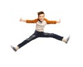 Happy smiling boy jumping in air Royalty Free Stock Photo