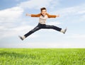 Happy smiling boy jumping in air Royalty Free Stock Photo