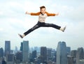 Happy smiling boy jumping in air Royalty Free Stock Photo