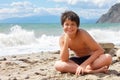 Happy smiling boy on the sea beach Royalty Free Stock Photo