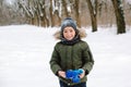 Happy smiling boy in winter clothes during walk. Happy winter holidays Royalty Free Stock Photo