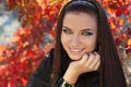 Happy smiling brunette girl. Autumn Woman