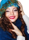 Happy Smiling Brunette wearing Knitted Blue Cap and Jersey